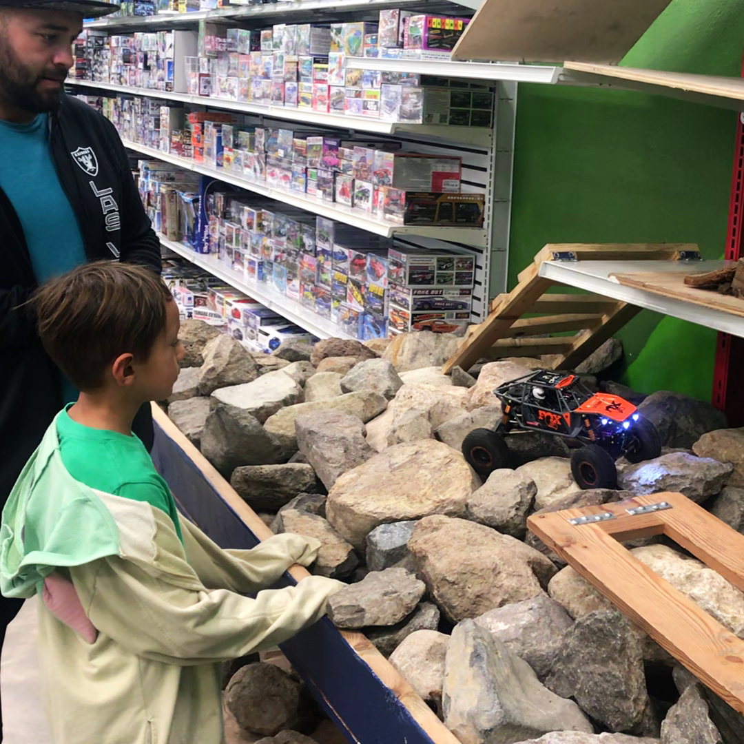 Dad-and-Son-indoor-RC-rock-crawling image