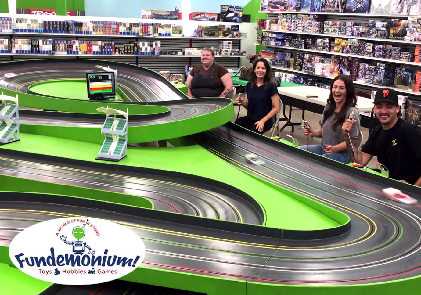 Grown-ups-playing-slot-cars image